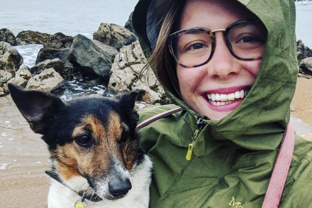 Smiling sitter with dog